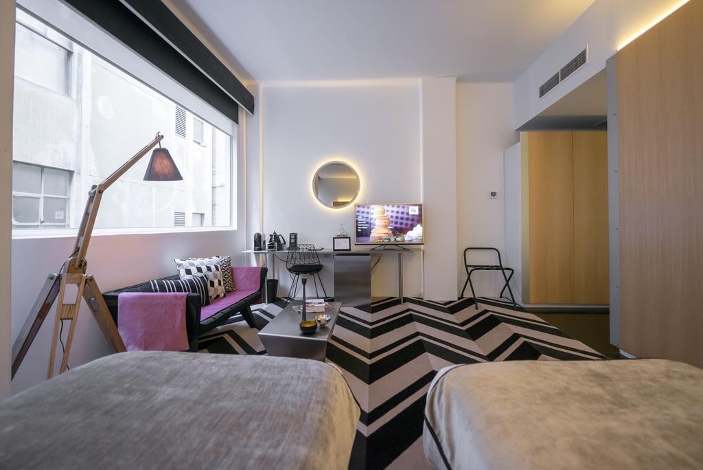 Adelphi Hotel Melbourne Kamer foto A room at the hotel